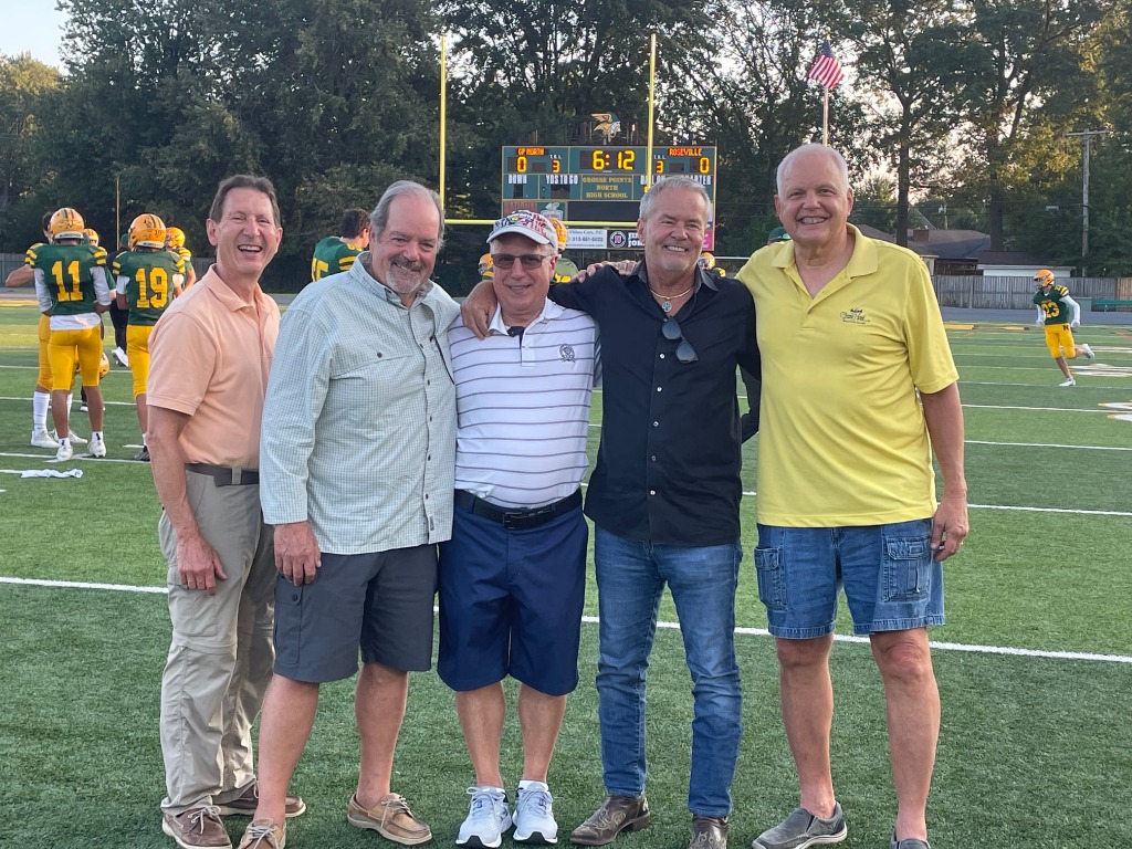 1971 football team members honored by current GPN football team: Bob Friedhoff, Bob Reynolds, Doug DAgostino, Clay James, Roger Ulmer