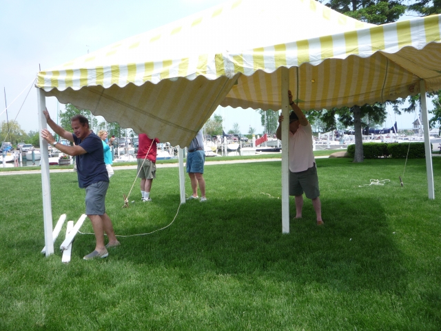 The tent starts to go up at Crescent for the picnic (photo courtesy Nancy LeRoy Burk)