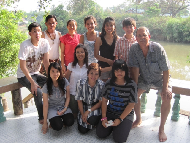 Richard Renas: Myself, wife, son and daughter in back row with in-laws in Thailand March 2011